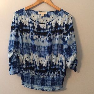 I am selling a Michael Kors t - shirt